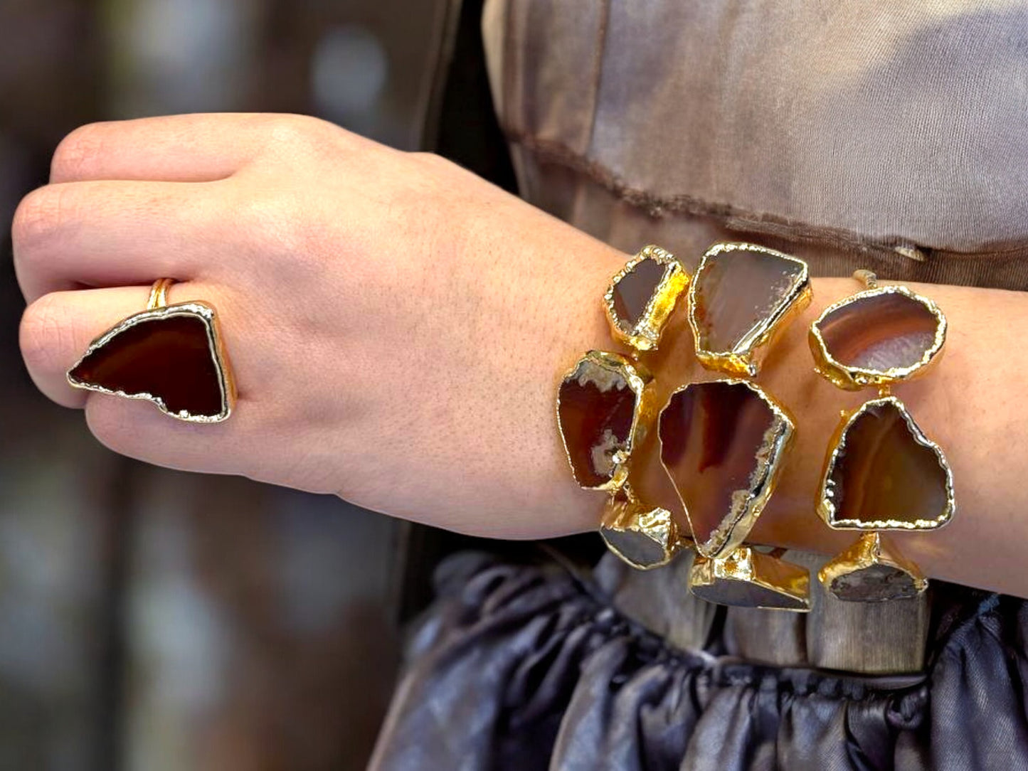 a close up of a person wearing a bracelet