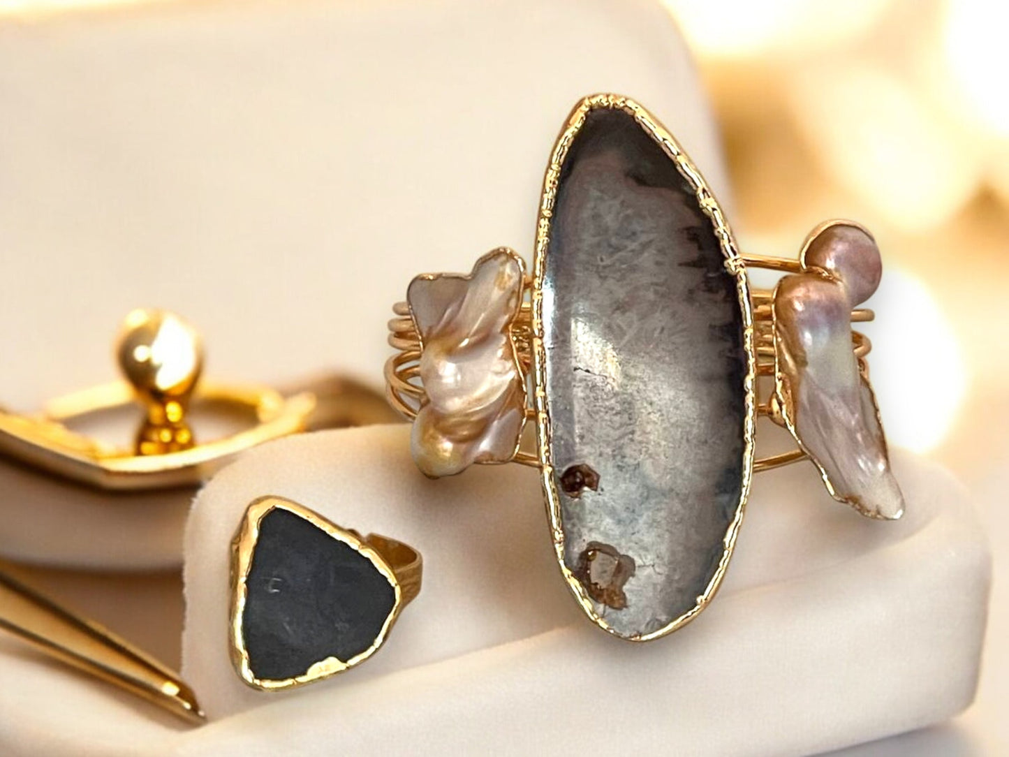 a close up of a ring with a stone