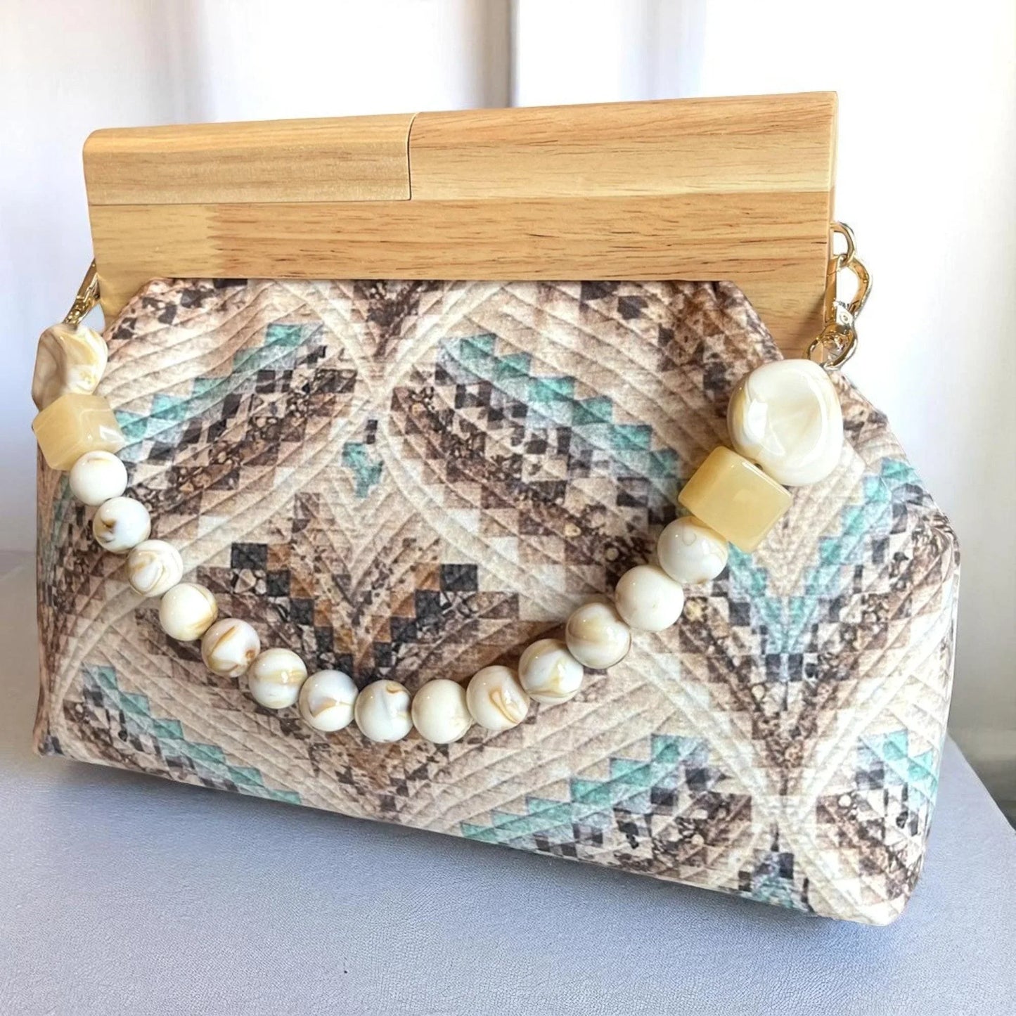 Boho Quilted Clutch with Beaded Handle | Handmade Earth-Tone Purse with Wooden Frame | Artisan Statement Bag - Glam Duchess