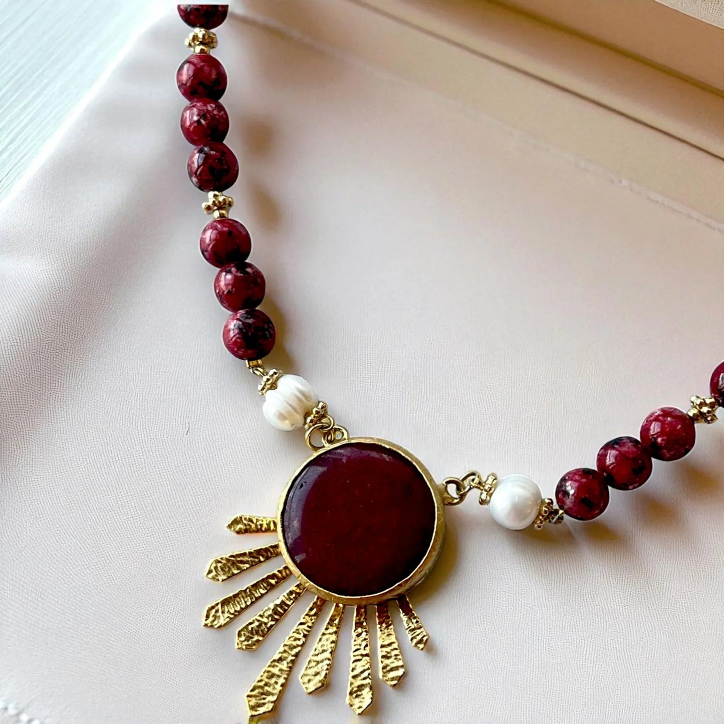 Gold-Plated Gemstone Necklace with Red Beads & Sunburst Pendant, Made in Turkiye - Glam Duchess