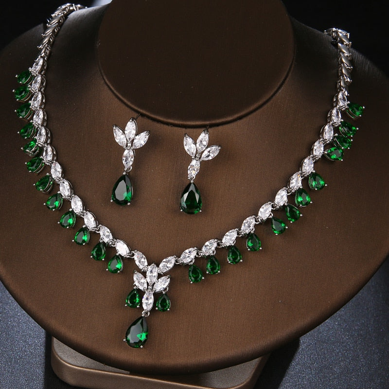 Exquisite Emerald Green Cubic Zirconia Necklace and Earrings Set
 
 Make a stunning statement with this exquisite jewelry set, featuring a captivating emerald green cubic zircon necklace and earrings. Whether you're attending a wGlam DuchessGlam DuchessExquisite Emerald Green Cubic Zirconia Necklace