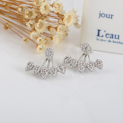 Elegant Crystal Flower Stud Earrings
 
 Add a touch of elegance to your outfit with these trendy crystal flower stud earrings. The irregular shape and intricate design make them a perfect accessory forGlam DuchessGlam DuchessElegant Crystal Flower Stud Earrings