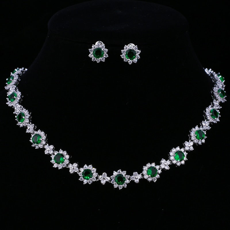 Exquisite Emerald Green Cubic Zirconia Necklace and Earrings Set
 
 Make a stunning statement with this exquisite jewelry set, featuring a captivating emerald green cubic zircon necklace and earrings. Whether you're attending a wGlam DuchessGlam DuchessExquisite Emerald Green Cubic Zirconia Necklace