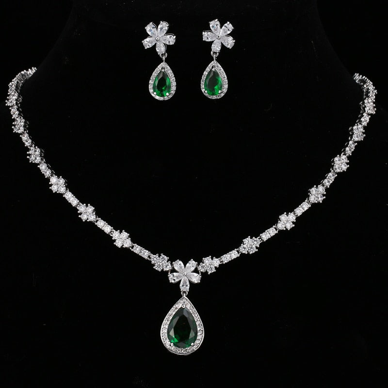 Exquisite Emerald Green Cubic Zirconia Necklace and Earrings Set
 
 Make a stunning statement with this exquisite jewelry set, featuring a captivating emerald green cubic zircon necklace and earrings. Whether you're attending a wGlam DuchessGlam DuchessExquisite Emerald Green Cubic Zirconia Necklace