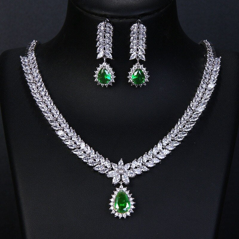 Exquisite Emerald Green Cubic Zirconia Necklace and Earrings Set
 
 Make a stunning statement with this exquisite jewelry set, featuring a captivating emerald green cubic zircon necklace and earrings. Whether you're attending a wGlam DuchessGlam DuchessExquisite Emerald Green Cubic Zirconia Necklace