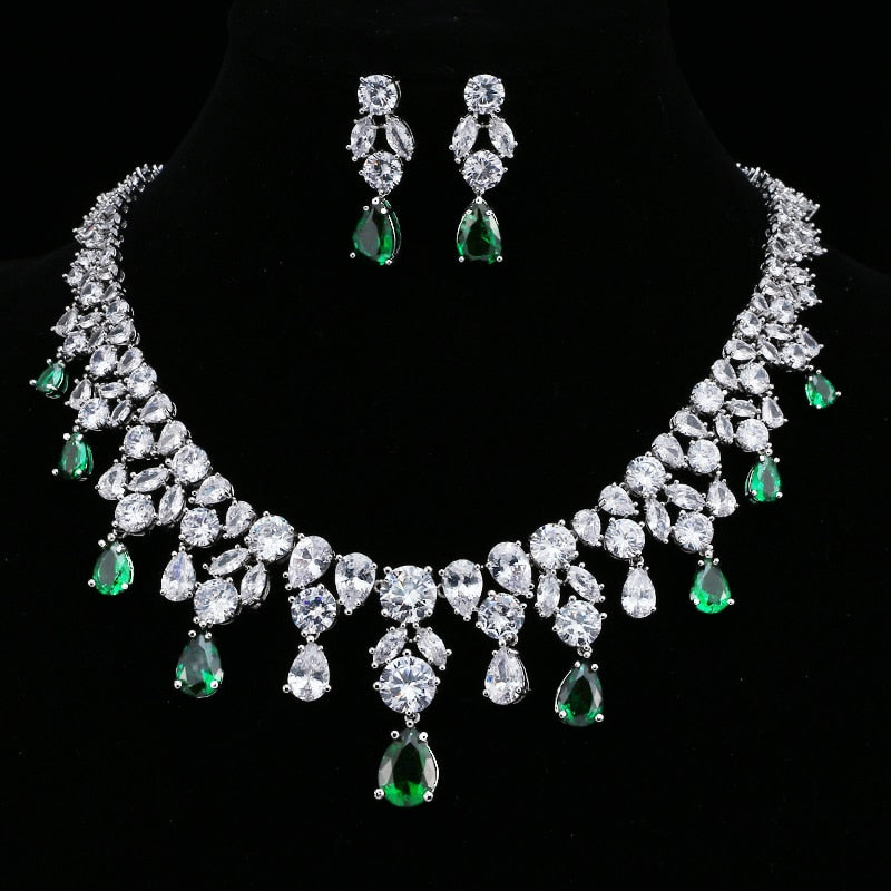 Exquisite Emerald Green Cubic Zirconia Necklace and Earrings Set
 
 Make a stunning statement with this exquisite jewelry set, featuring a captivating emerald green cubic zircon necklace and earrings. Whether you're attending a wGlam DuchessGlam DuchessExquisite Emerald Green Cubic Zirconia Necklace