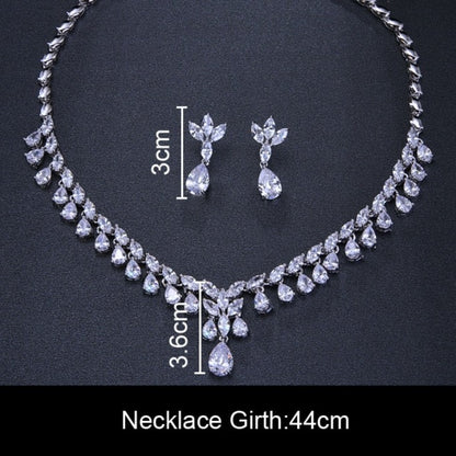 Cubic Zirconia Drop Necklace and Earrings Set with Plant-Inspired Desi
 
 Make a statement at any occasion with this trendy and elegant jewelry set. Crafted from high-quality copper and adorned with sparkling cubic zirconia, this set iGlam DuchessGlam DuchessCubic Zirconia Drop Necklace