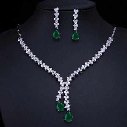 Exquisite Emerald Green Cubic Zirconia Necklace and Earrings Set
 
 Make a stunning statement with this exquisite jewelry set, featuring a captivating emerald green cubic zircon necklace and earrings. Whether you're attending a wGlam DuchessGlam DuchessExquisite Emerald Green Cubic Zirconia Necklace