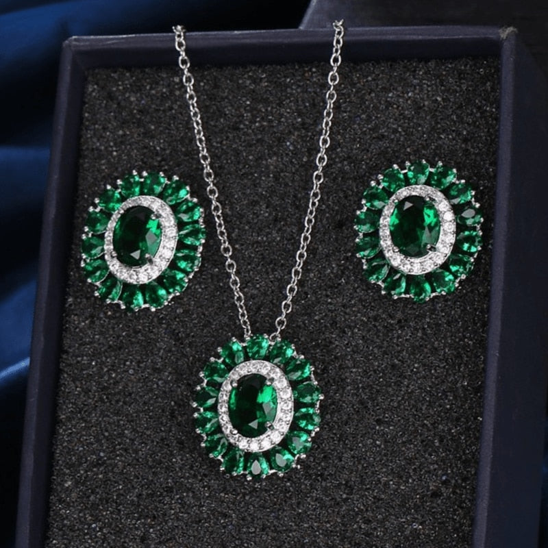 Exquisite Emerald Green Cubic Zirconia Necklace and Earrings Set
 
 Make a stunning statement with this exquisite jewelry set, featuring a captivating emerald green cubic zircon necklace and earrings. Whether you're attending a wGlam DuchessGlam DuchessExquisite Emerald Green Cubic Zirconia Necklace