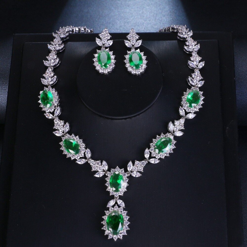 Exquisite Emerald Green Cubic Zirconia Necklace and Earrings Set
 
 Make a stunning statement with this exquisite jewelry set, featuring a captivating emerald green cubic zircon necklace and earrings. Whether you're attending a wGlam DuchessGlam DuchessExquisite Emerald Green Cubic Zirconia Necklace