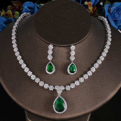 Exquisite Emerald Green Cubic Zirconia Necklace and Earrings Set
 
 Make a stunning statement with this exquisite jewelry set, featuring a captivating emerald green cubic zircon necklace and earrings. Whether you're attending a wGlam DuchessGlam DuchessExquisite Emerald Green Cubic Zirconia Necklace