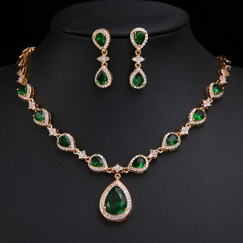 Exquisite Emerald Green Cubic Zirconia Necklace and Earrings Set
 
 Make a stunning statement with this exquisite jewelry set, featuring a captivating emerald green cubic zircon necklace and earrings. Whether you're attending a wGlam DuchessGlam DuchessExquisite Emerald Green Cubic Zirconia Necklace