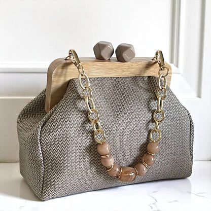 Handmade Beige Woven Clutch Bag with Wooden Frame and Marble Beaded Handle – Elegant Textured Purse for Women - Glam Duchess