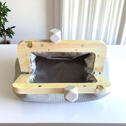 Handmade Beige Woven Clutch Bag with Wooden Frame and Marble Beaded Handle – Elegant Textured Purse for Women - Glam Duchess