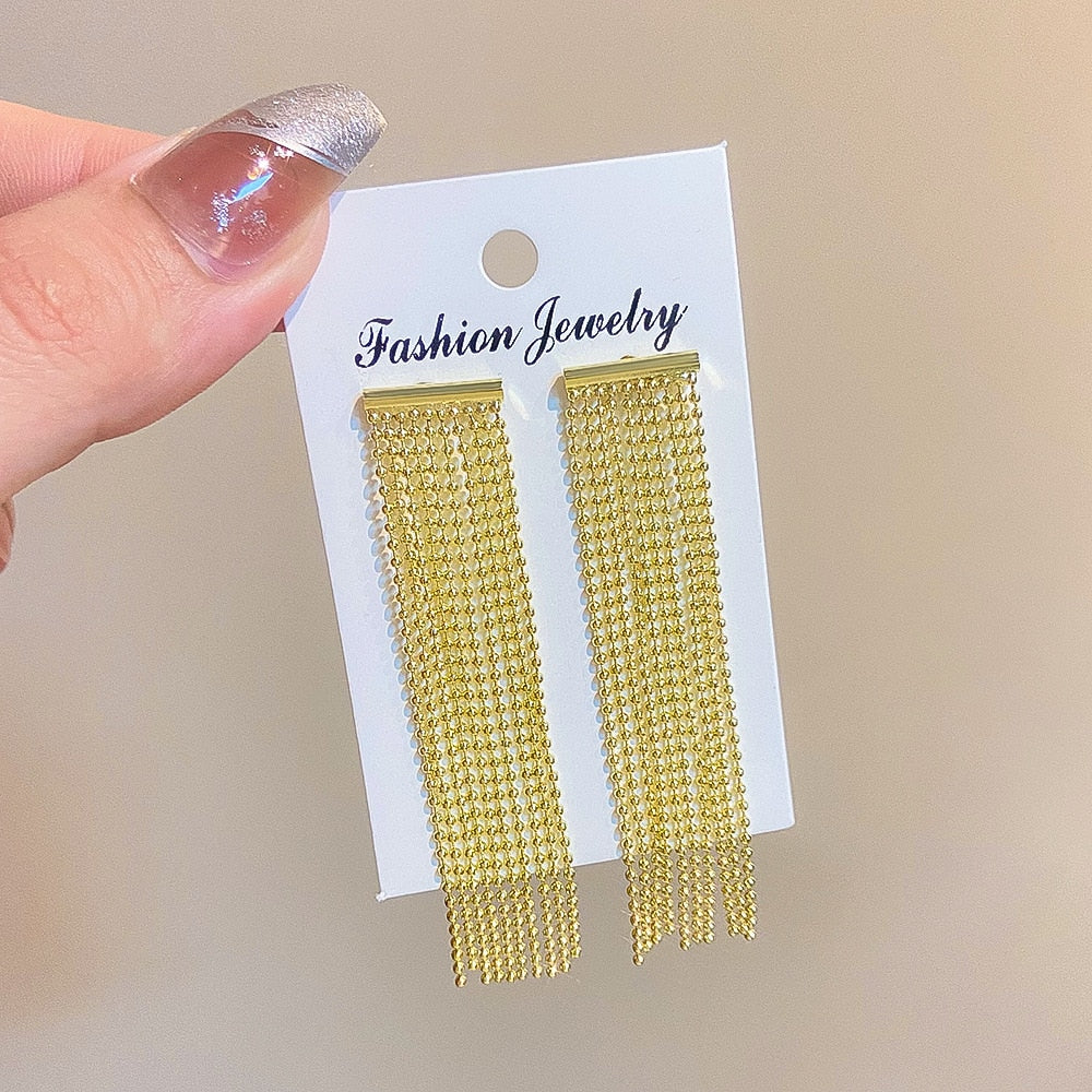 Golden Geometric Tassel Statement Earrings