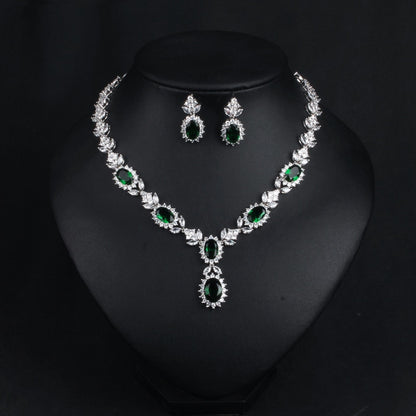 Exquisite Emerald Green Cubic Zirconia Necklace and Earrings Set
 
 Make a stunning statement with this exquisite jewelry set, featuring a captivating emerald green cubic zircon necklace and earrings. Whether you're attending a wGlam DuchessGlam DuchessExquisite Emerald Green Cubic Zirconia Necklace