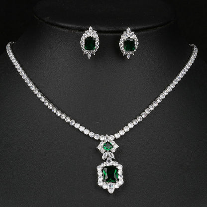 Exquisite Emerald Green Cubic Zirconia Necklace and Earrings Set
 
 Make a stunning statement with this exquisite jewelry set, featuring a captivating emerald green cubic zircon necklace and earrings. Whether you're attending a wGlam DuchessGlam DuchessExquisite Emerald Green Cubic Zirconia Necklace