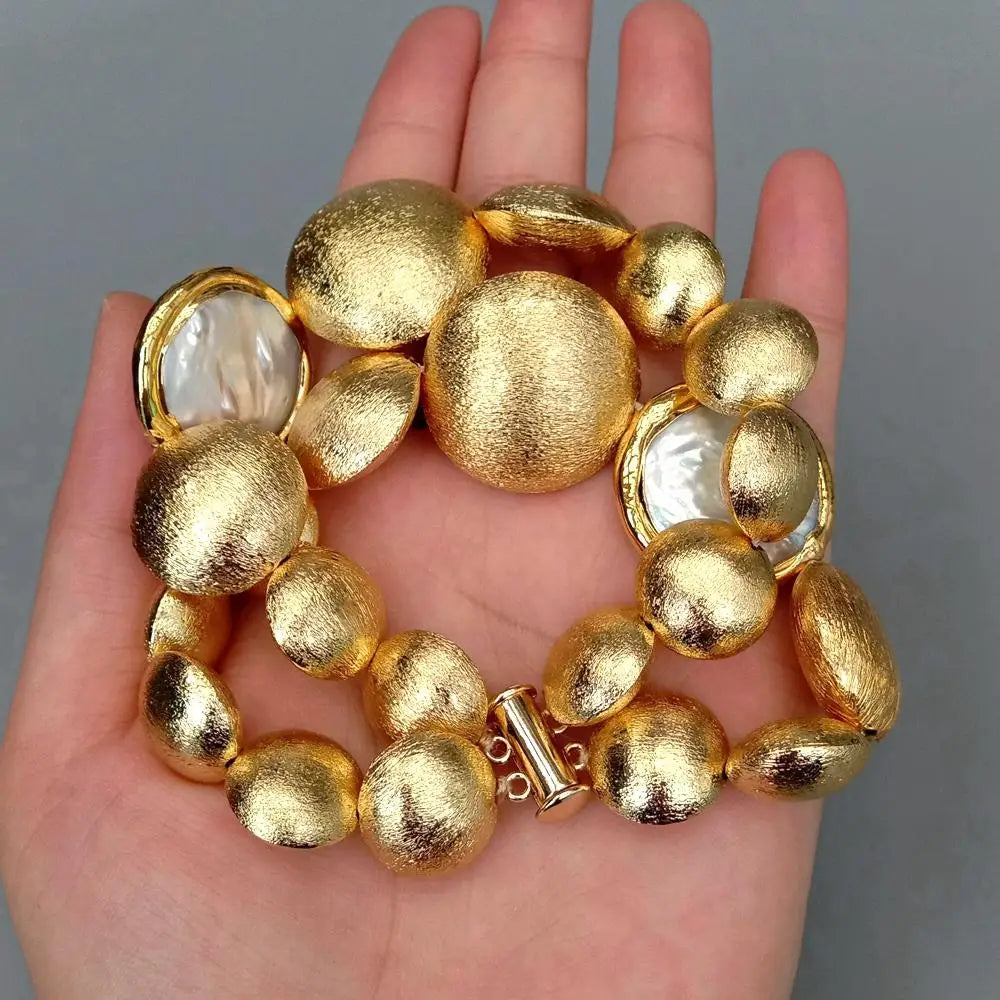 White Coin Pearl and Brushed Bead Strand Bracelet with Gold Plating