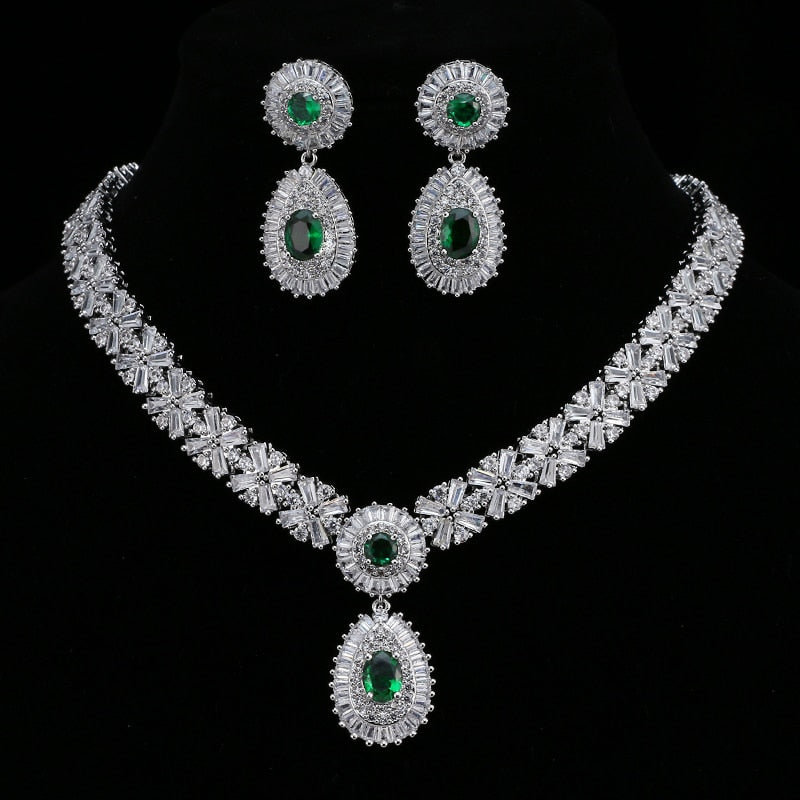 Exquisite Emerald Green Cubic Zirconia Necklace and Earrings Set
 
 Make a stunning statement with this exquisite jewelry set, featuring a captivating emerald green cubic zircon necklace and earrings. Whether you're attending a wGlam DuchessGlam DuchessExquisite Emerald Green Cubic Zirconia Necklace