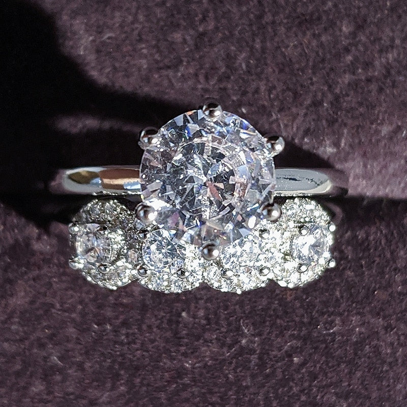 Luxurious Cubic Zirconia Bridal Ring
 Experience Timeless Elegance with Our Cubic Zirconia Luxury Wedding Ring
 Embrace classic sophistication with our exquisite cubic zirconia wedding ring. Crafted toGlam DuchessGlam DuchessLuxurious Cubic Zirconia Bridal Ring