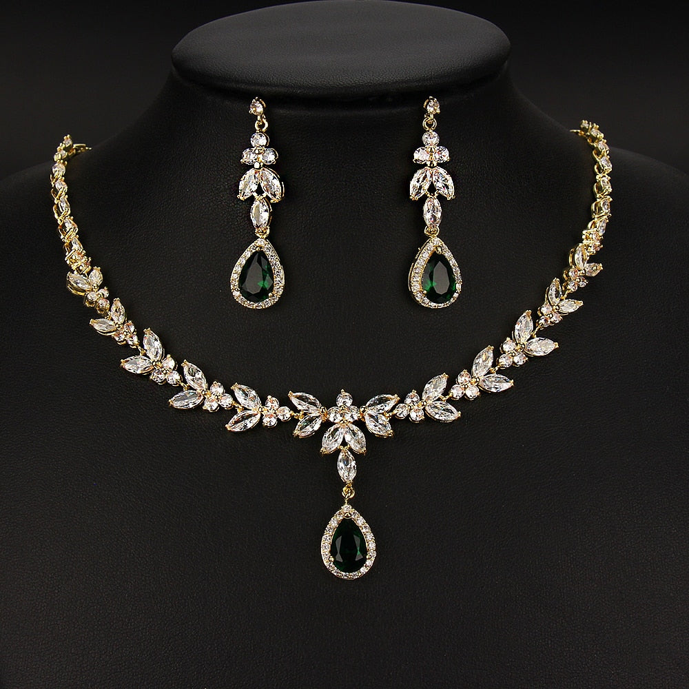 Exquisite Emerald Green Cubic Zirconia Necklace and Earrings Set
 
 Make a stunning statement with this exquisite jewelry set, featuring a captivating emerald green cubic zircon necklace and earrings. Whether you're attending a wGlam DuchessGlam DuchessExquisite Emerald Green Cubic Zirconia Necklace