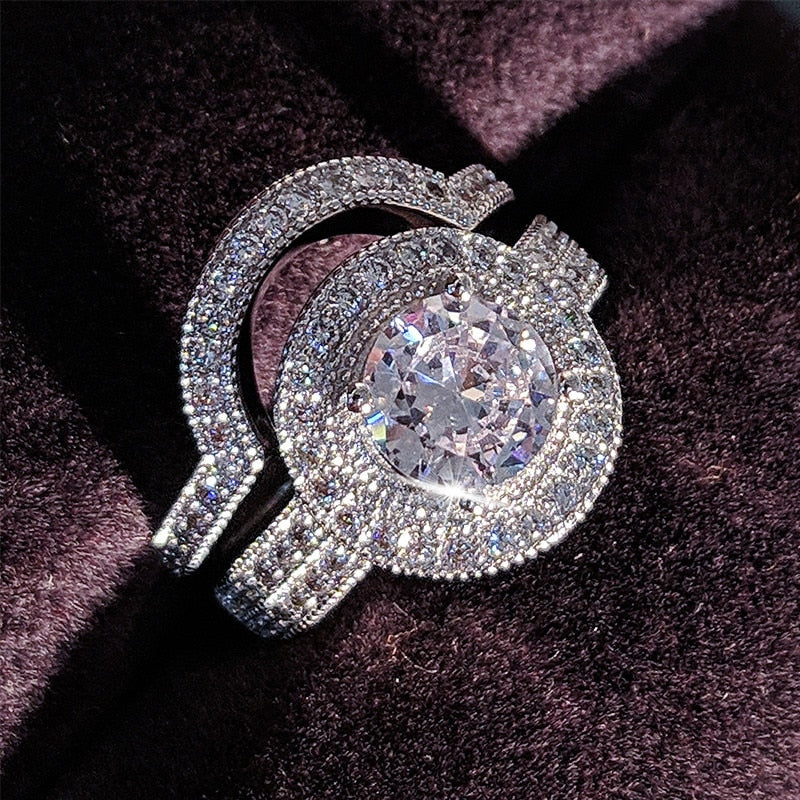 Luxurious Cubic Zirconia Bridal Ring
 Experience Timeless Elegance with Our Cubic Zirconia Luxury Wedding Ring
 Embrace classic sophistication with our exquisite cubic zirconia wedding ring. Crafted toGlam DuchessGlam DuchessLuxurious Cubic Zirconia Bridal Ring