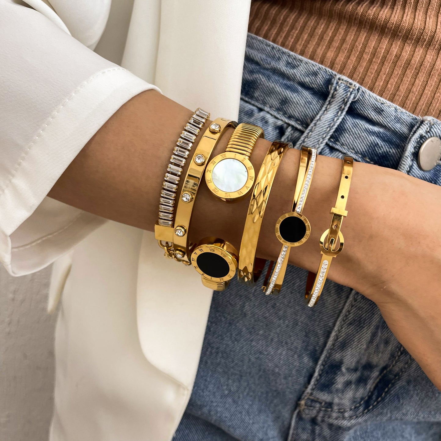 Chic Geometric Gold-Plated Stainless Steel Bangles
 Stackable Bangles High Fashion Bracelets
 Elevate your style with our trendy stackable bangles, designed with a geometric pattern and tension setting for a modern Glam DuchessGlam DuchessChic Geometric Gold-Plated Stainless Steel Bangles