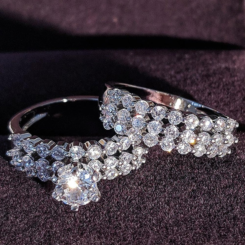 Luxurious Cubic Zirconia Bridal Ring
 Experience Timeless Elegance with Our Cubic Zirconia Luxury Wedding Ring
 Embrace classic sophistication with our exquisite cubic zirconia wedding ring. Crafted toGlam DuchessGlam DuchessLuxurious Cubic Zirconia Bridal Ring