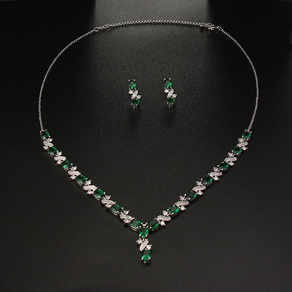 Exquisite Emerald Green Cubic Zirconia Necklace and Earrings Set
 
 Make a stunning statement with this exquisite jewelry set, featuring a captivating emerald green cubic zircon necklace and earrings. Whether you're attending a wGlam DuchessGlam DuchessExquisite Emerald Green Cubic Zirconia Necklace