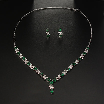 Exquisite Emerald Green Cubic Zirconia Necklace and Earrings Set
 
 Make a stunning statement with this exquisite jewelry set, featuring a captivating emerald green cubic zircon necklace and earrings. Whether you're attending a wGlam DuchessGlam DuchessExquisite Emerald Green Cubic Zirconia Necklace