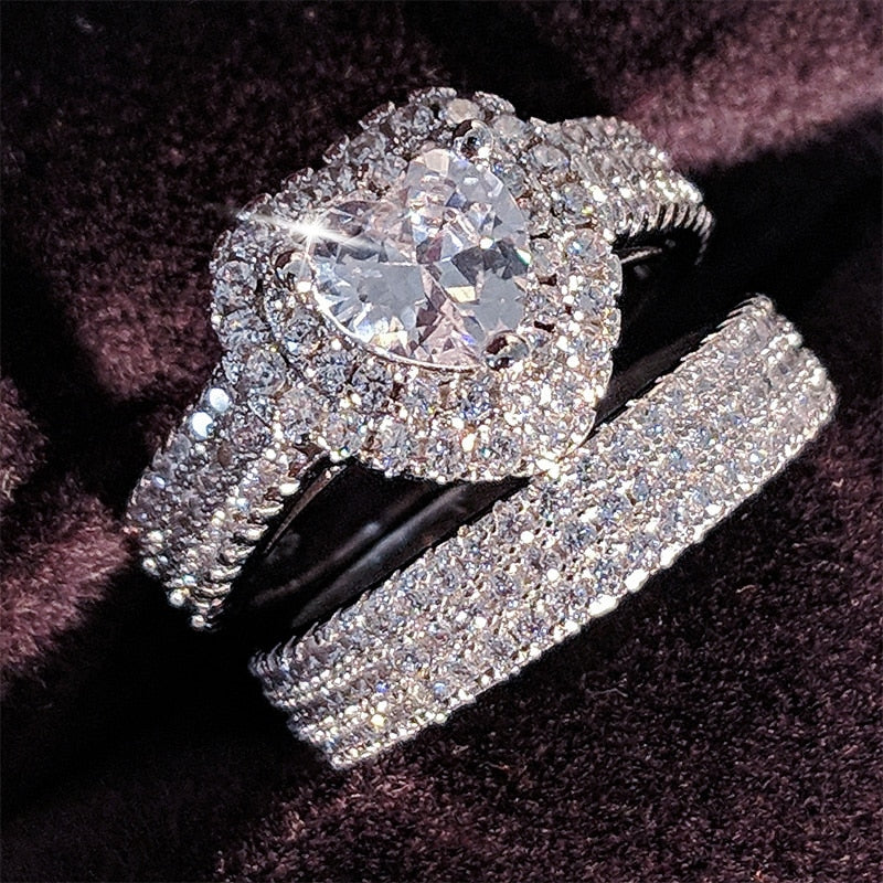 Luxurious Cubic Zirconia Bridal Ring
 Experience Timeless Elegance with Our Cubic Zirconia Luxury Wedding Ring
 Embrace classic sophistication with our exquisite cubic zirconia wedding ring. Crafted toGlam DuchessGlam DuchessLuxurious Cubic Zirconia Bridal Ring