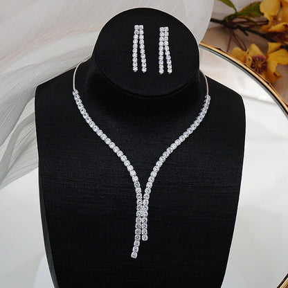 Elegant Geometric Crystal Jewelry Set with Necklace and Earrings
 Crystal Necklace Earrings Jewelry Set
 Enhance your elegance with our exquisite Crystal Necklace Earrings Jewelry Set. This trendy set is designed with geometric sGlam DuchessGlam DuchessElegant Geometric Crystal Jewelry Set