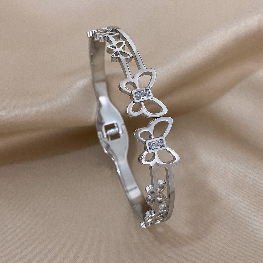 Butterfly Charm Stainless Steel Bangle Bracelets with Vintage Elegance