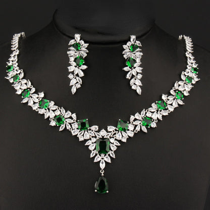 Exquisite Emerald Green Cubic Zirconia Necklace and Earrings Set
 
 Make a stunning statement with this exquisite jewelry set, featuring a captivating emerald green cubic zircon necklace and earrings. Whether you're attending a wGlam DuchessGlam DuchessExquisite Emerald Green Cubic Zirconia Necklace