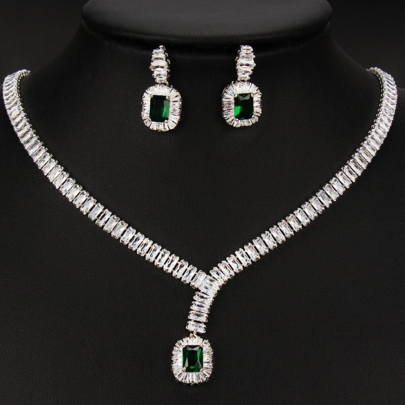 Exquisite Emerald Green Cubic Zirconia Necklace and Earrings Set
 
 Make a stunning statement with this exquisite jewelry set, featuring a captivating emerald green cubic zircon necklace and earrings. Whether you're attending a wGlam DuchessGlam DuchessExquisite Emerald Green Cubic Zirconia Necklace