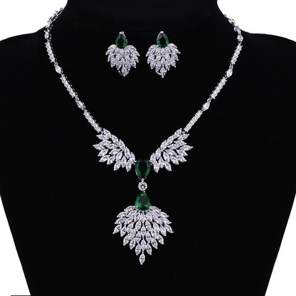 Exquisite Emerald Green Cubic Zirconia Necklace and Earrings Set
 
 Make a stunning statement with this exquisite jewelry set, featuring a captivating emerald green cubic zircon necklace and earrings. Whether you're attending a wGlam DuchessGlam DuchessExquisite Emerald Green Cubic Zirconia Necklace