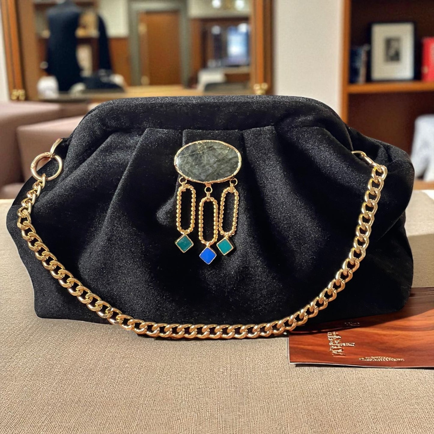 Velvet Black Evening Clutch with Gold Chain & Gemstone Accent