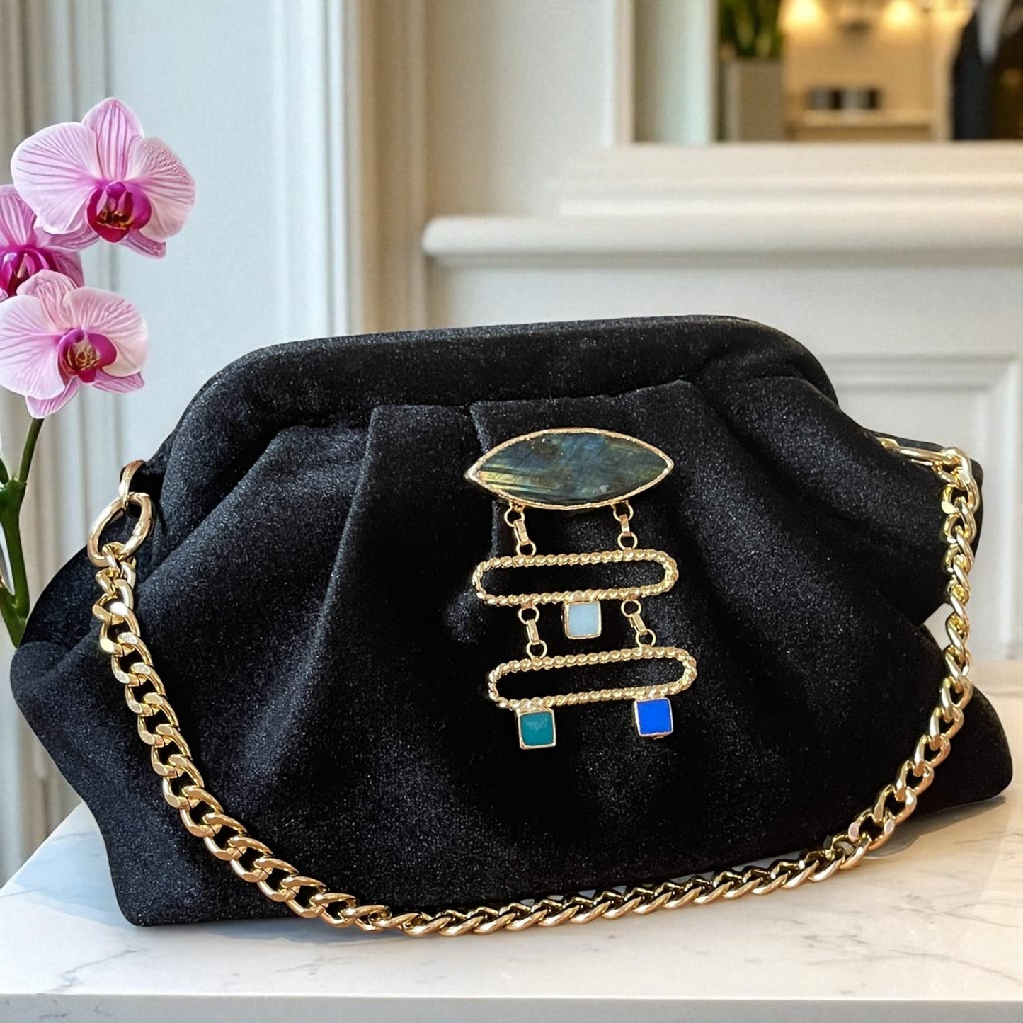 Velvet Black Evening Clutch with Gold Chain & Gemstone Accent