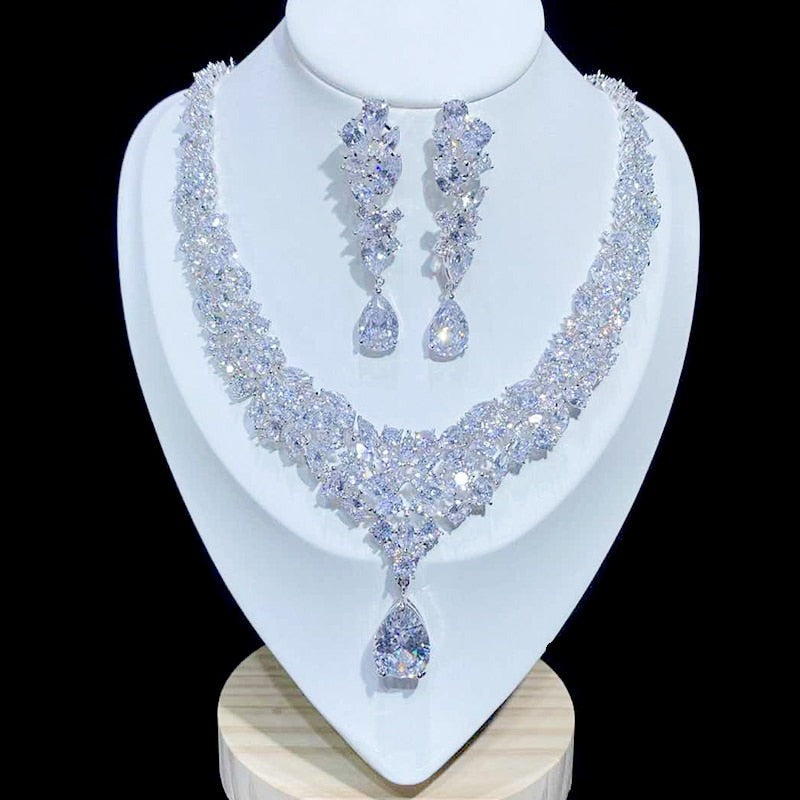 Exquisite Crystal Wedding Jewelry Set with Cubic Zirconia
 Make a Statement with Our Elegant Cubic Zirconia Wedding Jewelry Set
 Enhance your bridal attire or elevate your party look with this exquisite jewelry set. CrafteGlam DuchessGlam DuchessExquisite Crystal Wedding Jewelry Set