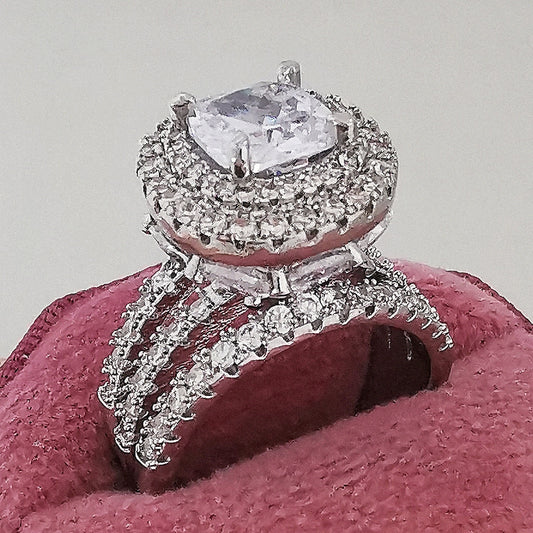 Vintage Silver Cubic Zirconia Wedding Ring
 Retro Silver Cubic Zirconia Wedding Ring
 Step back in time with this classic Retro Silver Cubic Zirconia Wedding Ring. Its timeless design and intricate detail maGlam DuchessGlam DuchessVintage Silver Cubic Zirconia Wedding Ring