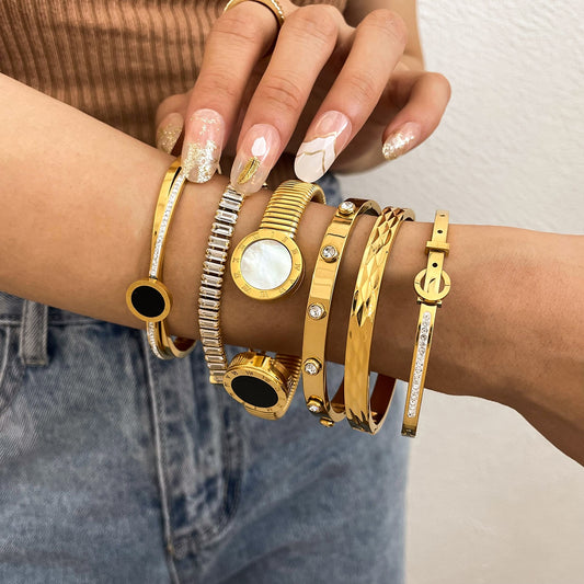 Chic Geometric Gold-Plated Stainless Steel Bangles
 Stackable Bangles High Fashion Bracelets
 Elevate your style with our trendy stackable bangles, designed with a geometric pattern and tension setting for a modern Glam DuchessGlam DuchessChic Geometric Gold-Plated Stainless Steel Bangles